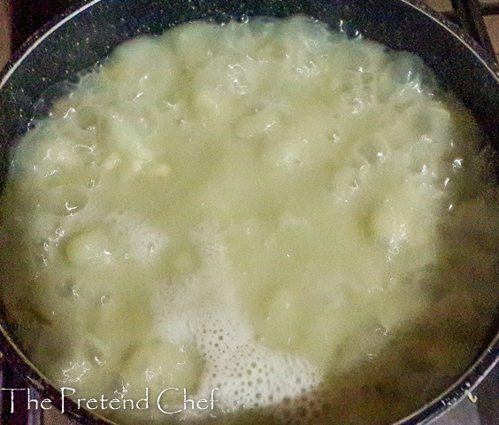 African breadfruit porridge cooking in a pot