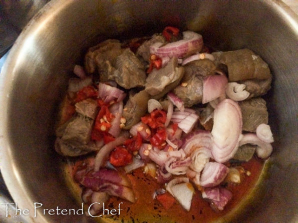 Bushmeat and vegetable cooking in a pot