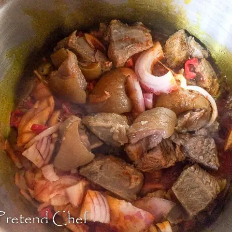 Bushmeat and vegetable cooking in a pot