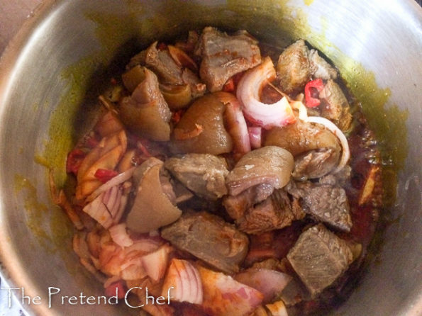 Bushmeat and vegetable cooking in a pot