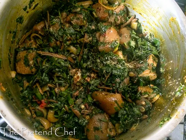 Bushmeat and vegetable cooking in a pot