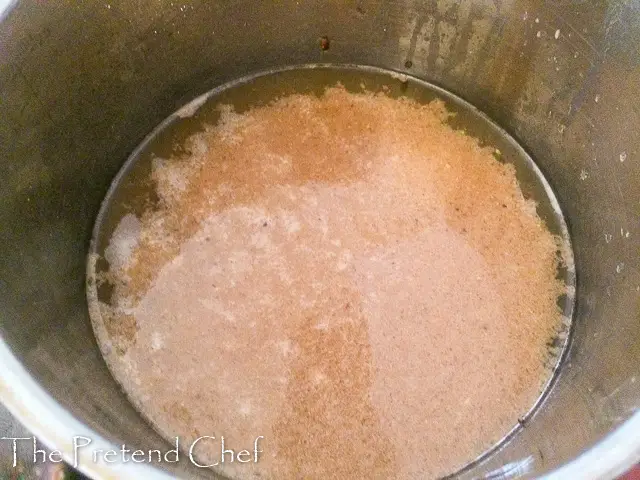 Akaun water boiling for Ewedu Soup