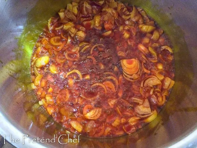 onions frying in palm oil for Afang Soup Deluxe
