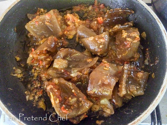 stir frying Peppered Ponmo (cowskin)