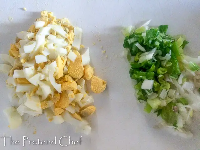 chopped ingredients for Egg and Sardine empanada filling