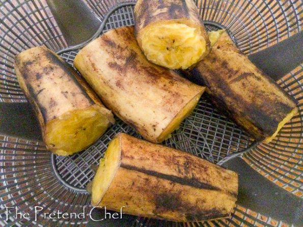 boiled plantains in a sieve for ripe plantain empanada