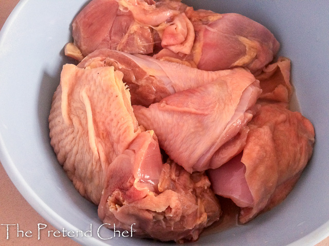 chicken in a bowl for oven baked jerk chicken