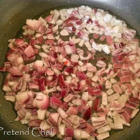 onions frying for Nigerian Greens and beans