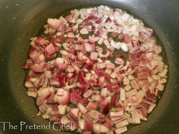 onions frying for Nigerian Greens and beans