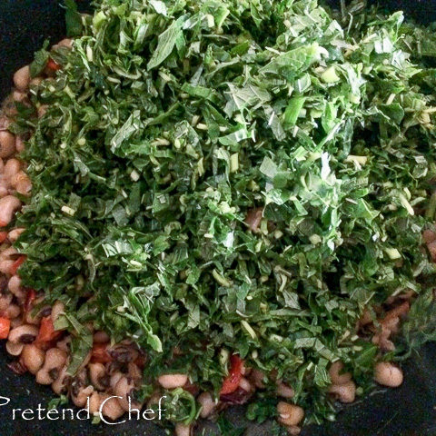 Nigerian Greens and beans cooking in a pot