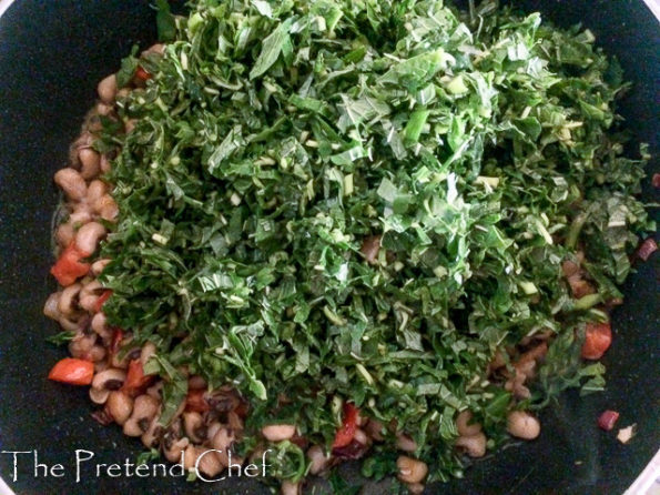 Nigerian Greens and beans cooking in a pot