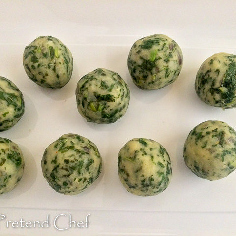 uncooked potato green vegetable balls