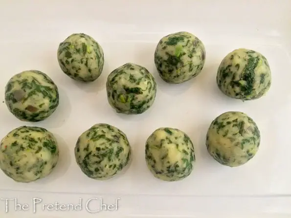 uncooked potato green vegetable balls