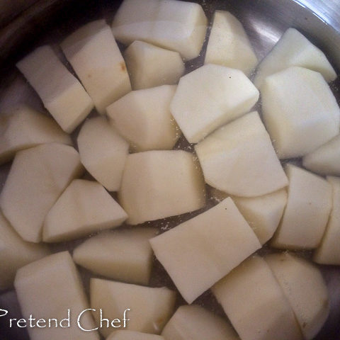 boiling potatoes in a pot