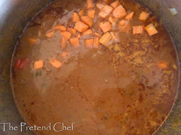 rich tomato gravy in a pot