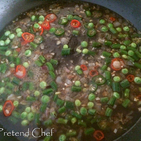 vegetable broth boiling in a pot for vegetable couscous