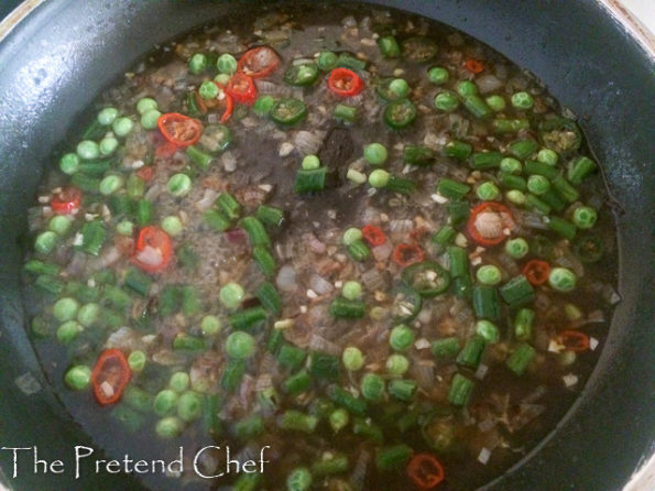 vegetable broth boiling in a pot for vegetable couscous