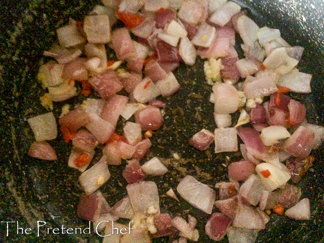 onions frying for yellow rice