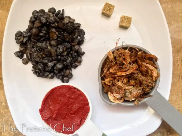 crayfish, iru, tomato paste, seasoning cubes for red ofada stew