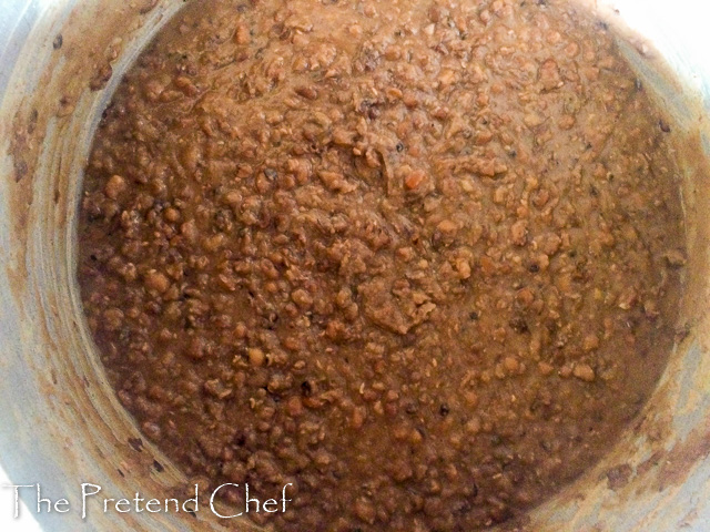 mashed oloyin beans in a pot for ewa agoyin