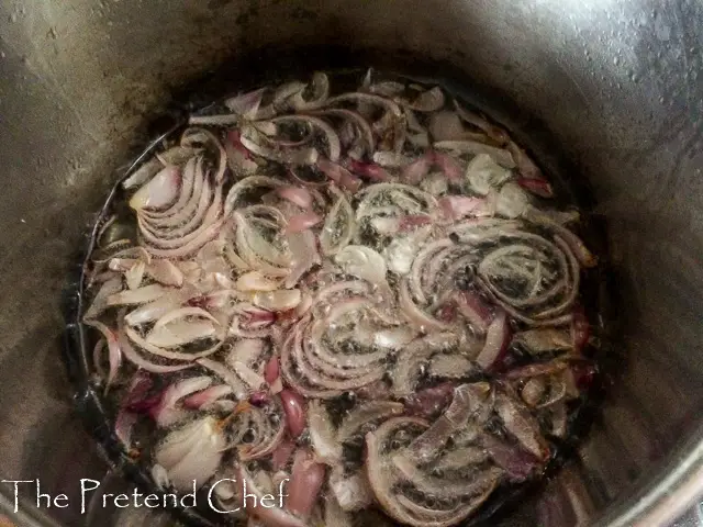 Onions frying in a pot