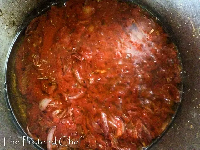 Tomato Paste Stew frying in a pot