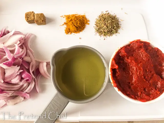 ingredients in a tray for Tomato Paste Stew (Tomato Puree Stew, Tinned Tomato Stew)