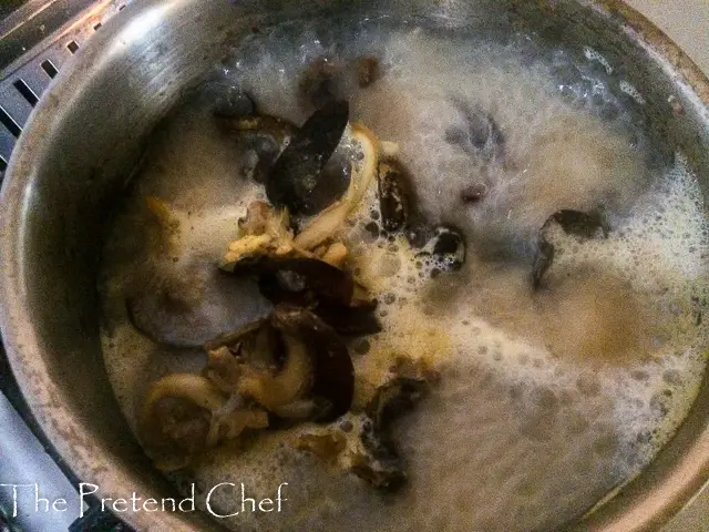 Snails cooking in a pot