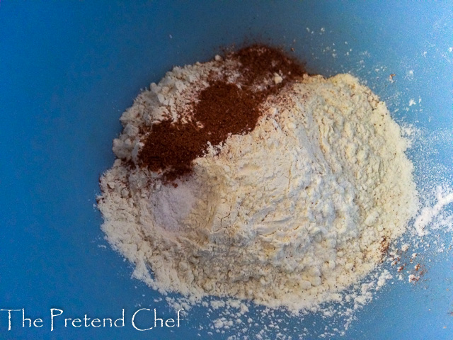 dry ingredients for sweet rice fritters in a bowl