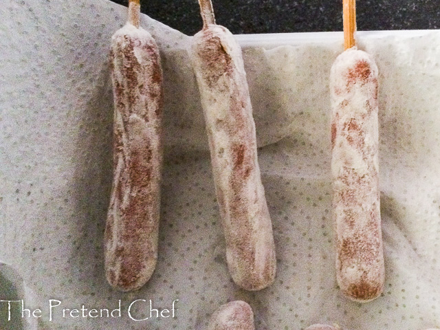 skewered hot dogs dusted with flour