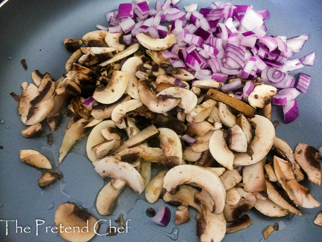 Mushroom and onions in a saucepan