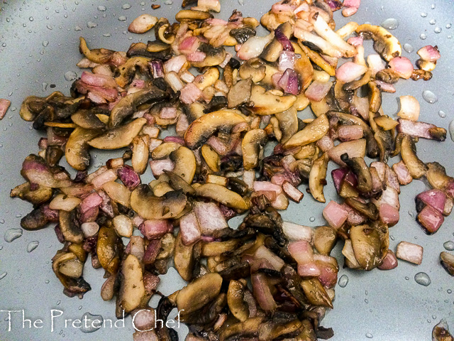 Mushroom and onions in a saucepan