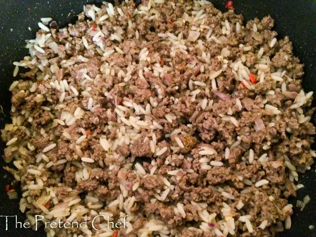 minced meat and rice in a frying pan
