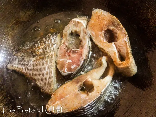 Fish frying in a saucepan