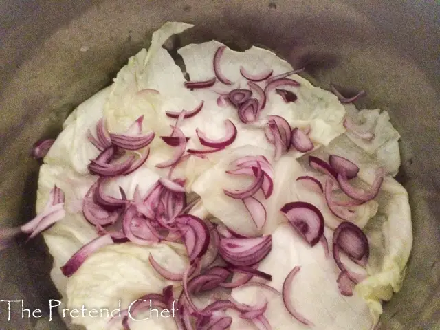 cabbage and onions in a pot