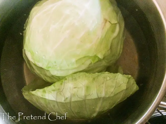 cabbage head in simmering water