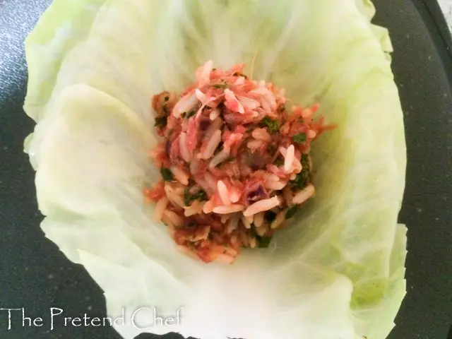 cabbage leaf being filled