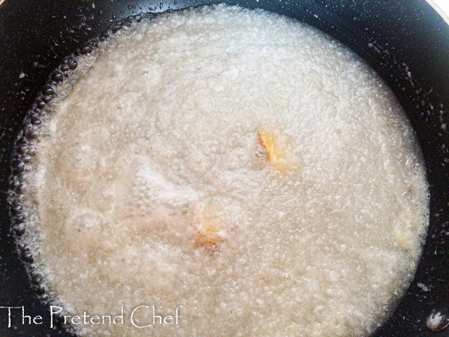  Jamaican Grater Cake bubbling in a saucepan