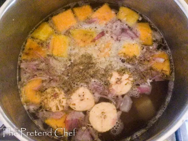 Jamaican chicken soup in a pot