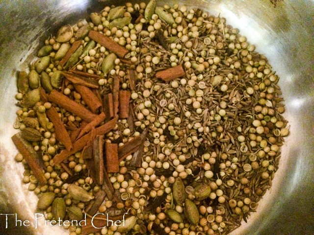 Spices for shawarma spice mix toasting in a frying pan