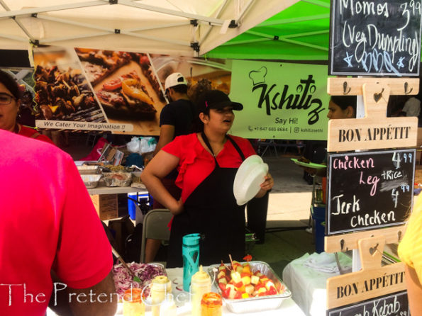 lady selling skewered fruits at taste of india toronto