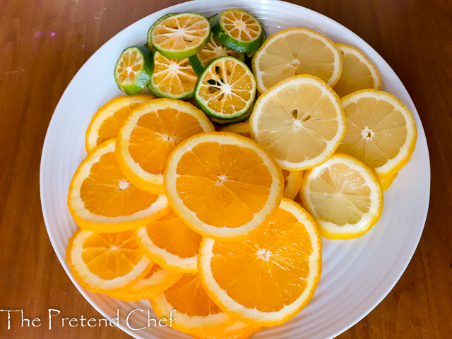 sliced fruits for candied lemon, orange and tangelo