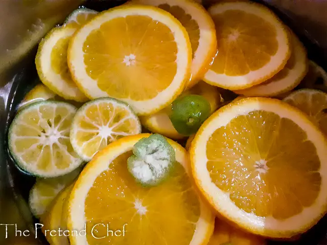 citrus slices simmering in water