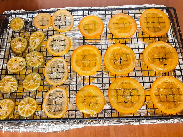 Candied Lemon slices drying on a rack