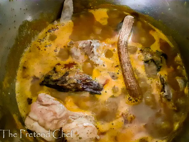 banga soup delta style cooking in a pot with oburuntete stick