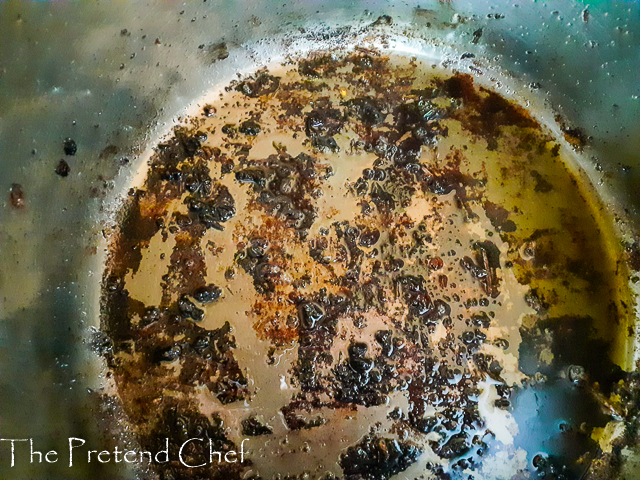 fried bits at the bottom of pot used to fry chicken