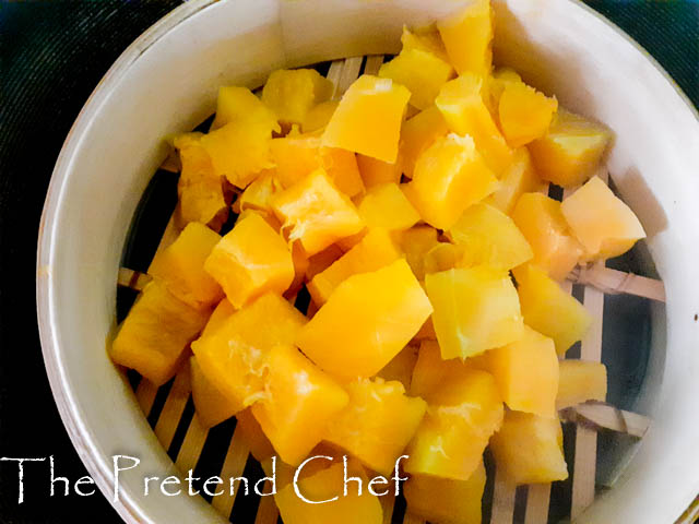 cubes of pumpkin in a steamer