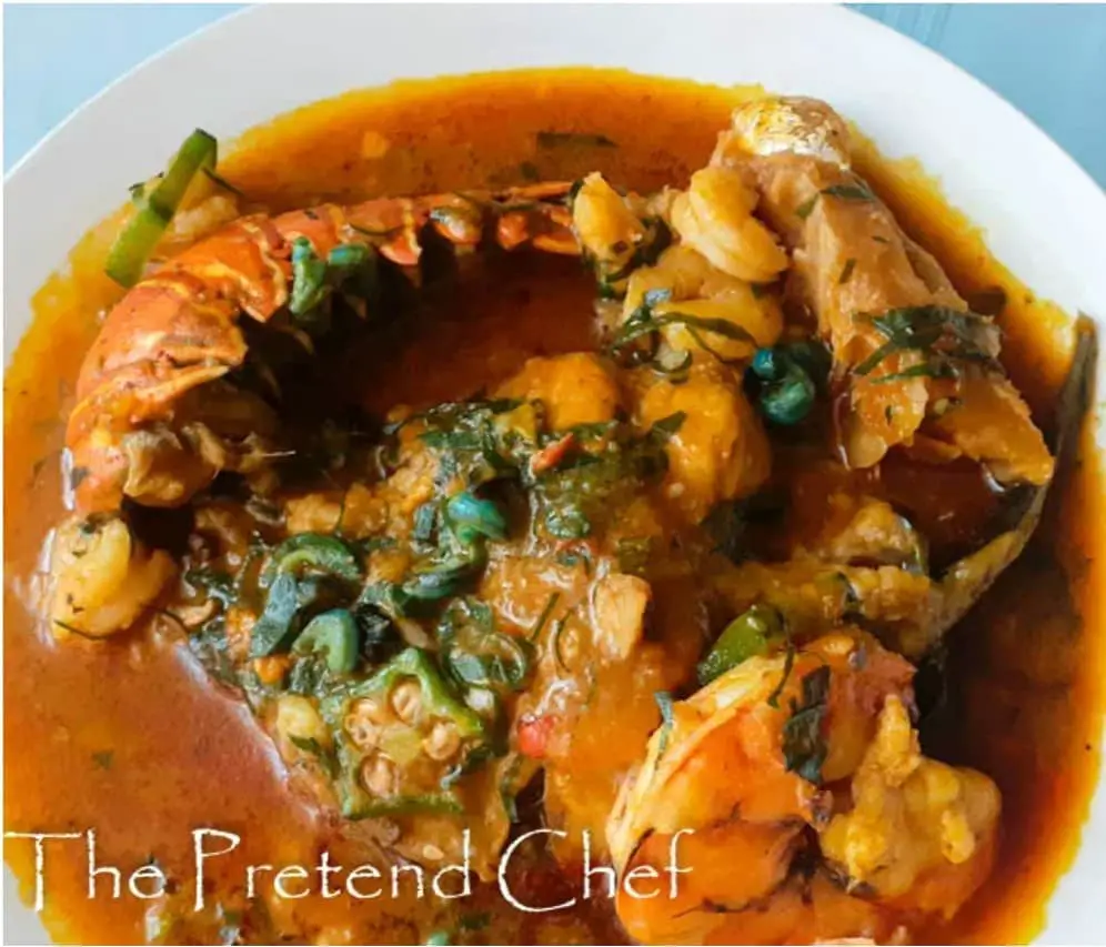 Nigerian Fisherman soup is a simple soup made with fish and other seafood as its protein sauce. 

It is called Efere Ndek Iyak in Efik and is indigenous to the people of Akwa-Ibom and Cross River states of Nigeria. 

Living with rivers winding through their towns and villages and bound by the Atlantic ocean, they have an abundance of seafood.
.
Recipe link in bio
.
.
.
.
.
.
.
#fishermansoup #nigerianfishermansoup #nigerdeltafood #nigerdelta #nigeriansoup #nigerianfoodie #nigerianfoodblogger #africanfoodblogger #huffpostfood #cnnfood #nigerianfood #thepretendchef