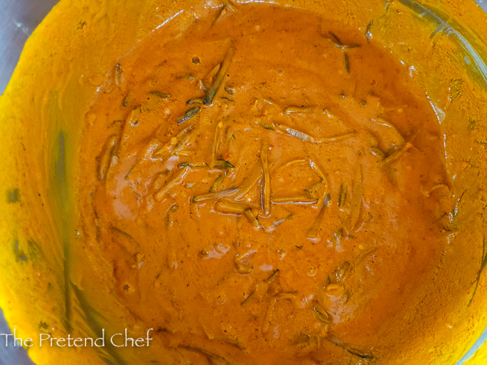 Creamy palm oil sauce with ugba