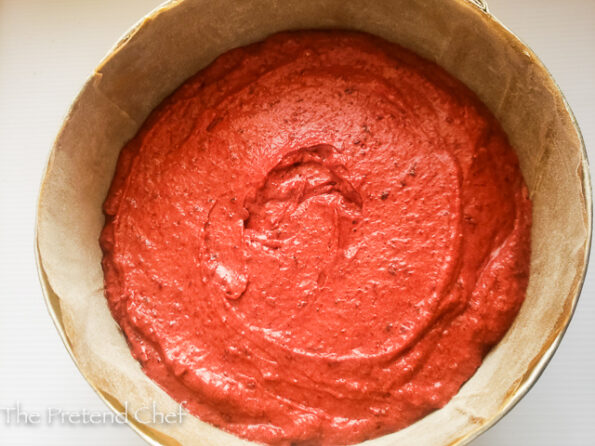 Jamaican Sorrel Fruit Cake batter in a cake tin